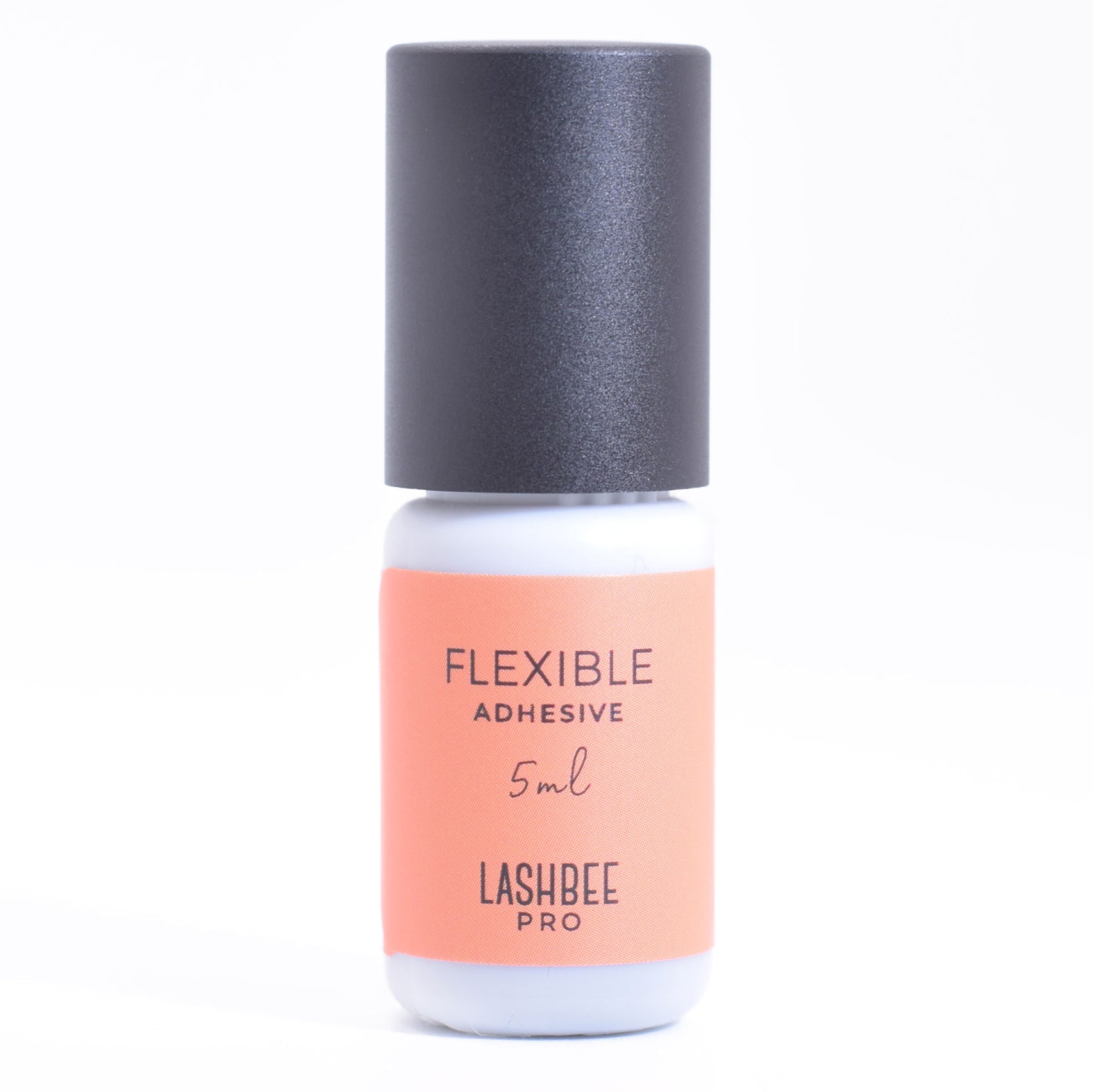 LashBeePro Flexible Adhesive for training in eyelash extensions - front of the orange bottle with black cap